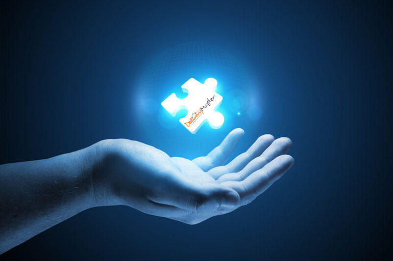 man holding a glowing single puzzle piece.